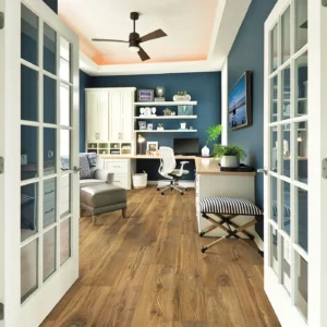 Laminate in a medium brown wood tone in a home office | Shoreline Flooring