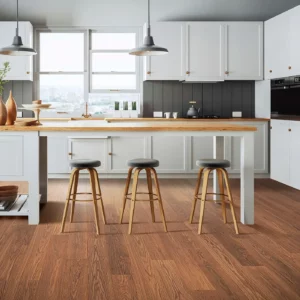 Mohawk Laminate in a rich reddish-brown wood color in a kitchen | Shoreline Flooring