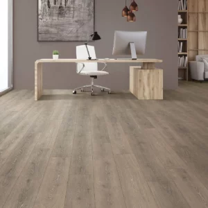 Mohawk Laminate in a gray-brown wood tone in a home office | Shoreline Flooring