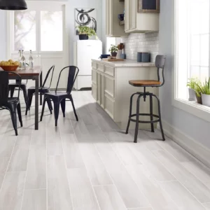 Shaw Floors light wood look tile in a kitchen | Shoreline Flooring