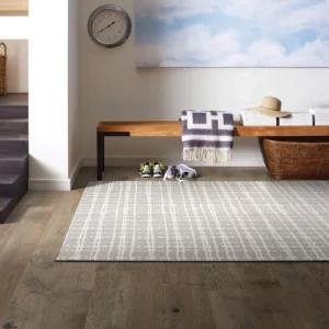 A light-colored Shaw Floors area rug | Shoreline Flooring