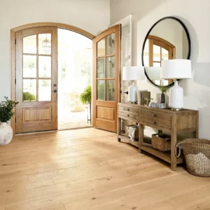Shaw Floors light hardwood in an entryway with large wooden double doorsy | Shoreline Flooring