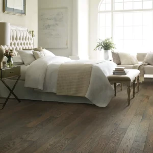 Shaw Floors medium brown Hardwood in a bedroom | Shoreline Flooring