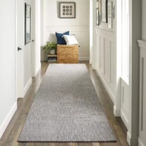 A long, grey Shaw Floors area rug | Shoreline Flooring