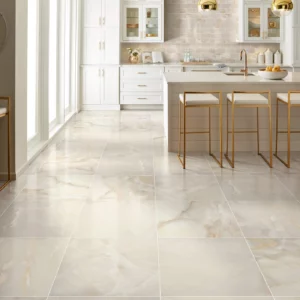 Shaw Floors Beige polished tile with subtle veining in a white kitchen | Shoreline Flooring