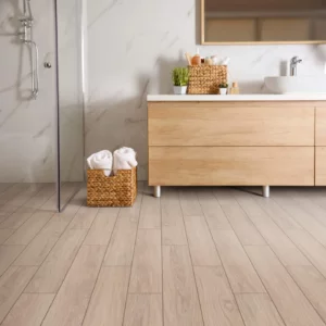 Shaw Floors tile with a light wood look, in a modern bathroom | Shoreline Flooring