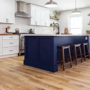 COREtec Luxury Vinyl in a light natural wood color in a kitchen | Shoreline Flooring