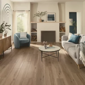 COREtec Luxury Vinyl in a medium brown wood tone in a living room | Shoreline Flooring